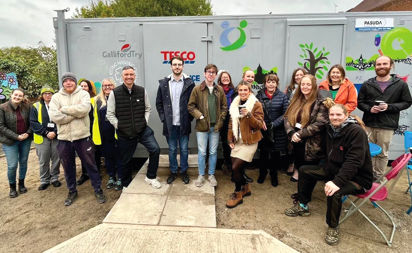 Local community people with cabin donated by Galliford Try under YOR4good