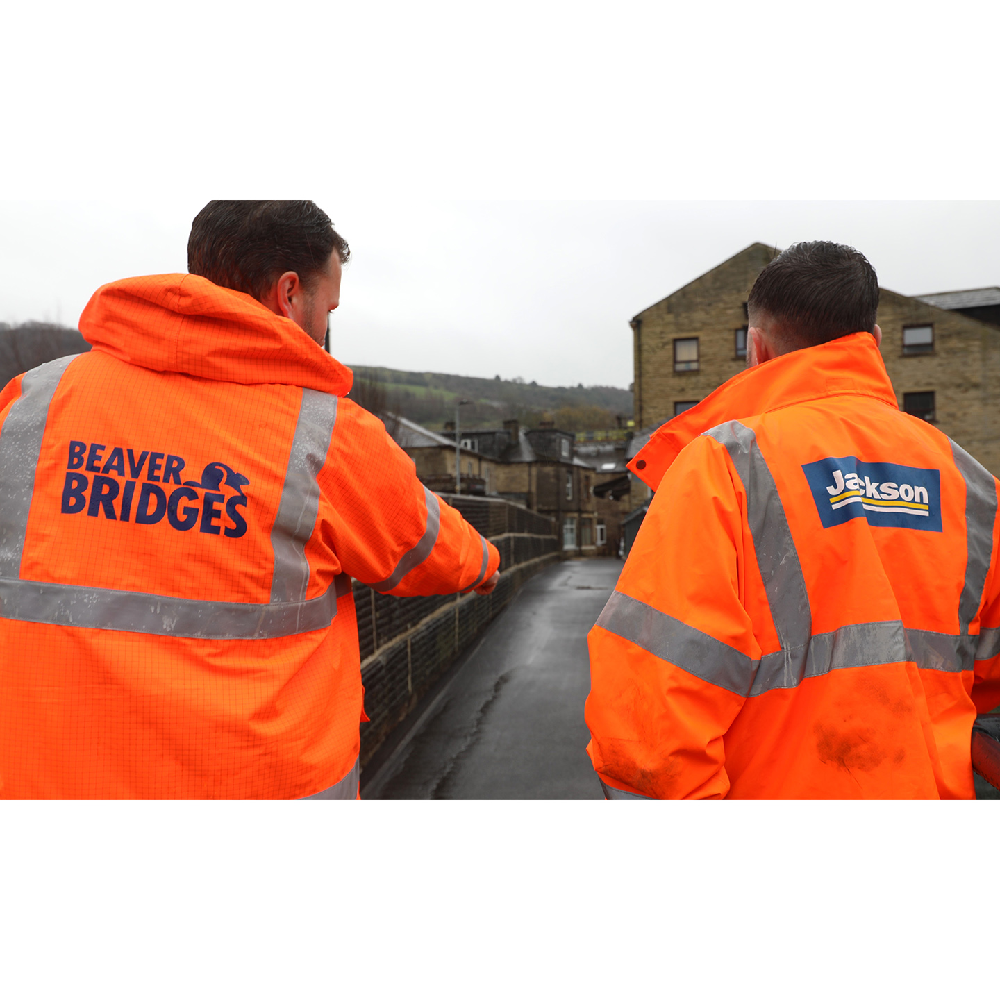Mytholmroyd footbridge workmen consultation