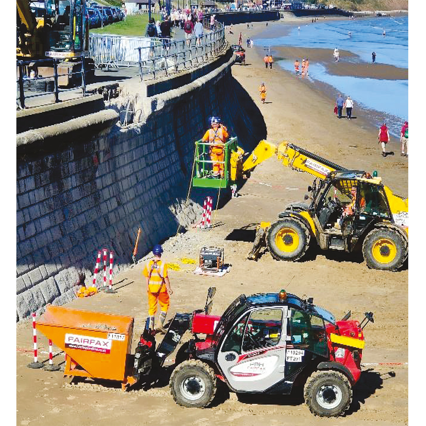 Jackson team using machinery at sea wall working at the sea wall Filey