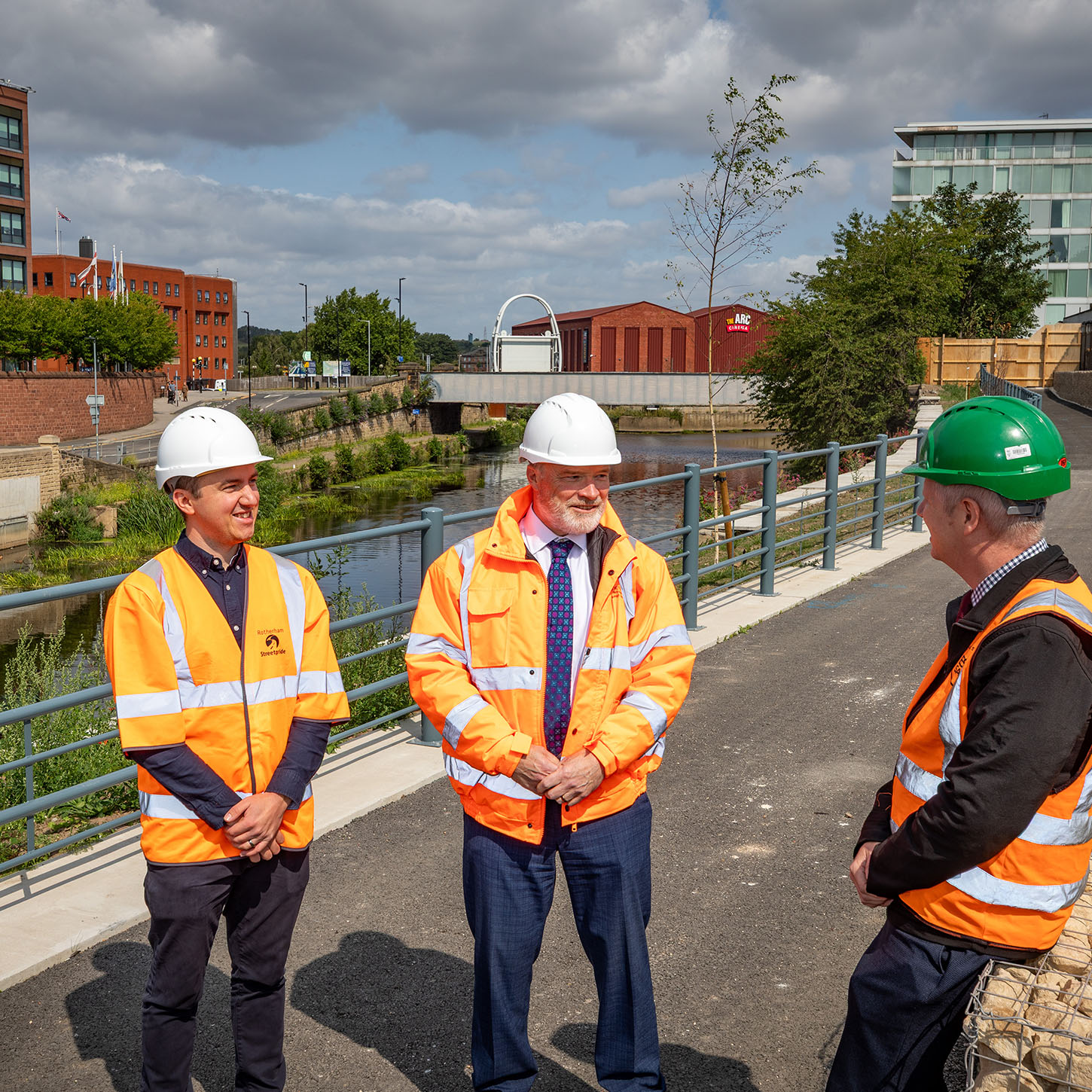 L-R Andrew Bramidge, strategic director for regeneration and environment at RMBC, Coun John Williams cabinet member for transport, jobs and the local economy at RMBC and Michael Sherrard, construction manager at Esh Construction and the new Rotherham river improvements