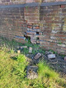 Badly deteriorated pier before repair