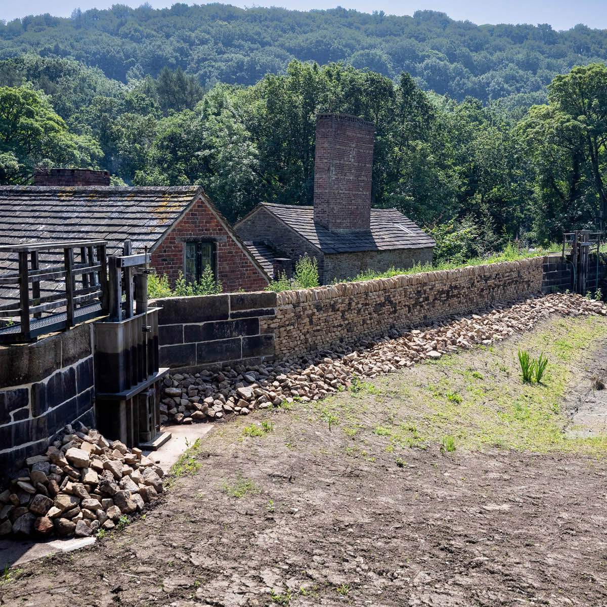 newly reconstructed wall at Abbeydale Dam