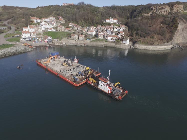 Runswick Bay Coastal Protection - image shows barge carrying boulders to form the coastal defences