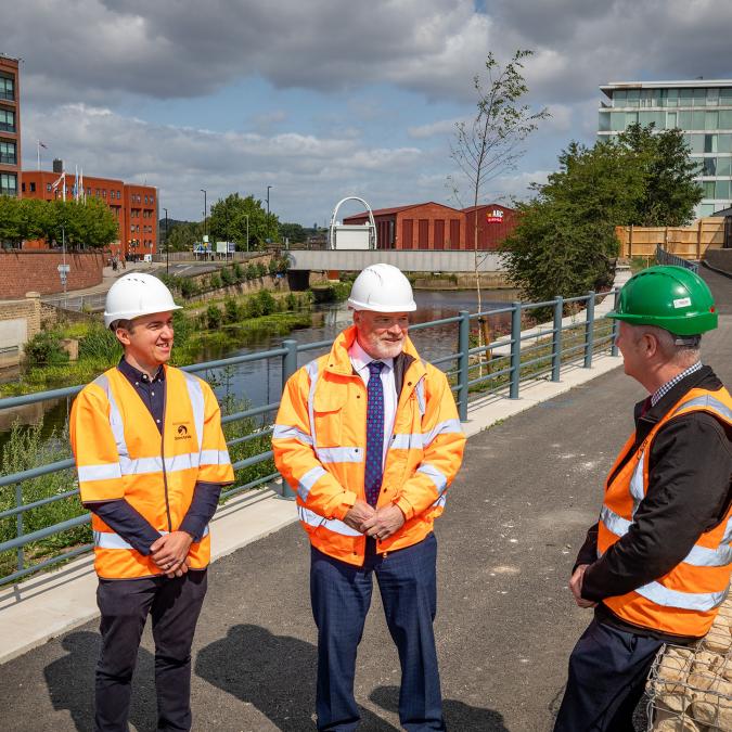 L-R Andrew Bramidge, strategic director for regeneration and environment at RMBC, Coun John Williams cabinet member for transport, jobs and the local economy at RMBC and Michael Sherrard, construction manager at Esh Construction and the new Rotherham river improvements